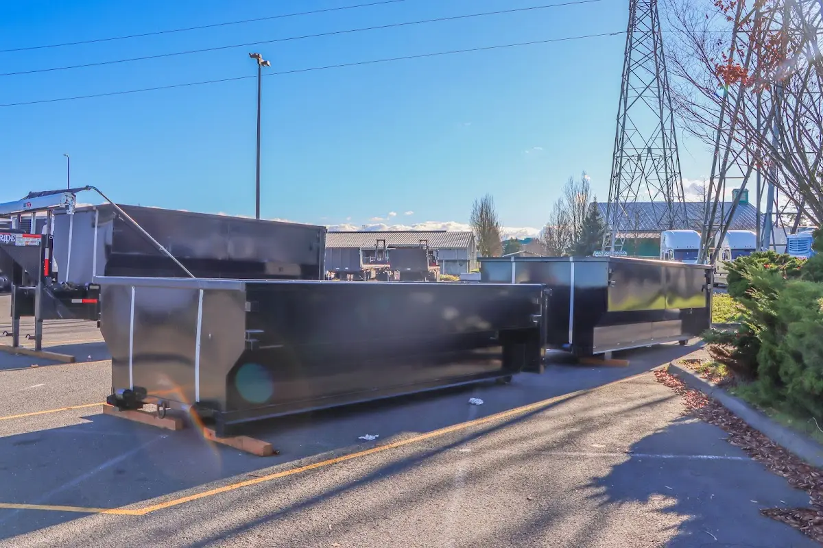 Roll-off dumpster ready for waste disposal at job site for Construction Dumpster Rental in Richmond Heights